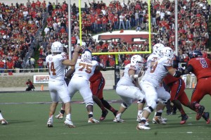 Texas quarterback David Ash back to pass in the Longhorns 31-22 victory against the Red Raiders on Saturday. 