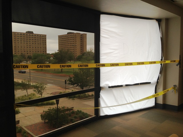Damaged window in College of Media and Communication Building